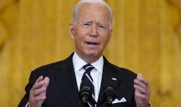 President Joe Biden speaks from the East Room of the White House in Washington, Wednesday, Aug 18, 2021, on the COVID-19 response and vaccination program. U.S. health officials Wednesday announced plans to offer COVID-19 booster shots to all Americans to shore up their protection amid the surging delta variant and signs that the vaccines&#39; effectiveness is falling. (AP Photo/Susan Walsh)