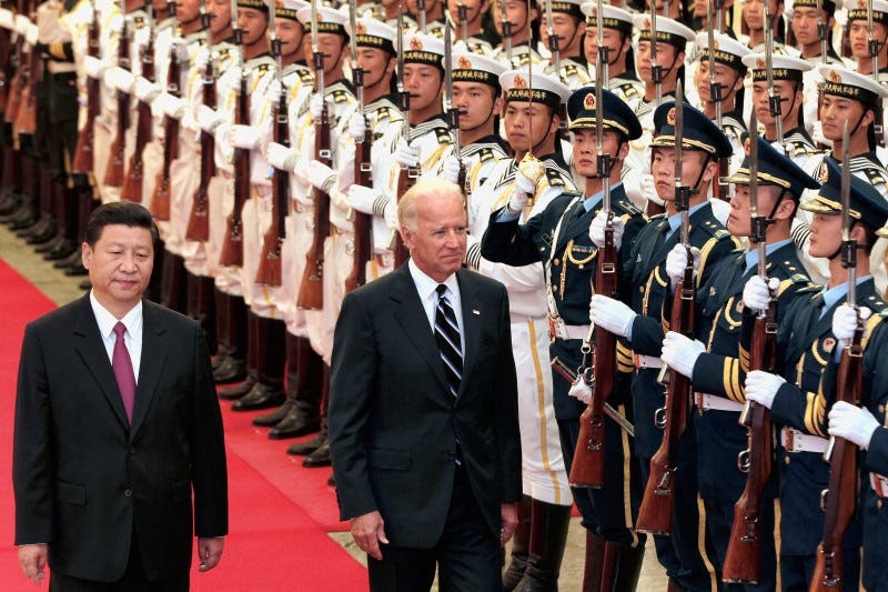 Chinese then-Vice President Xi Jinping and U.S. then-Vice President Joe Biden at a welcome ceremony inside the Great Hall of the People on Aug. 18, 2011 in Beijing.