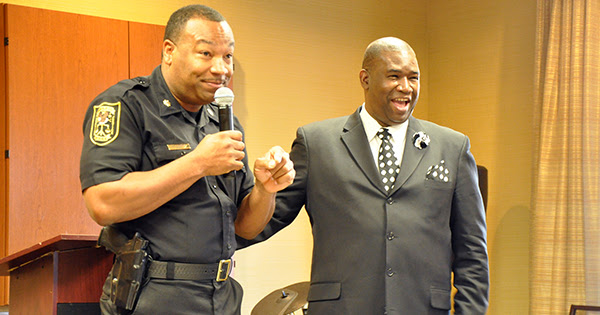 Orrin Hudson with local police officer, Be Someone
