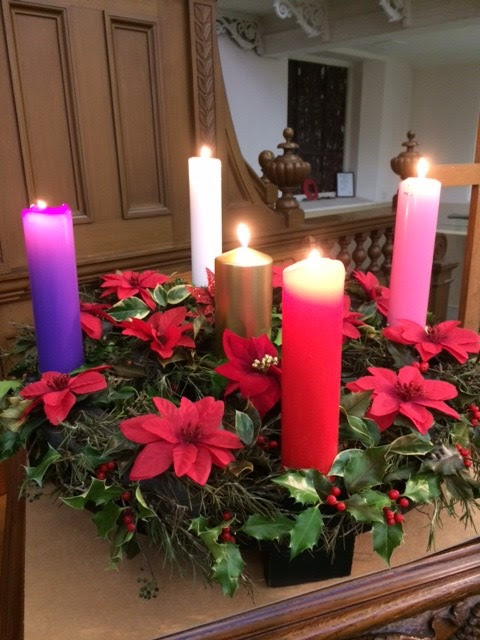 Christmas and Advent Candles all lit