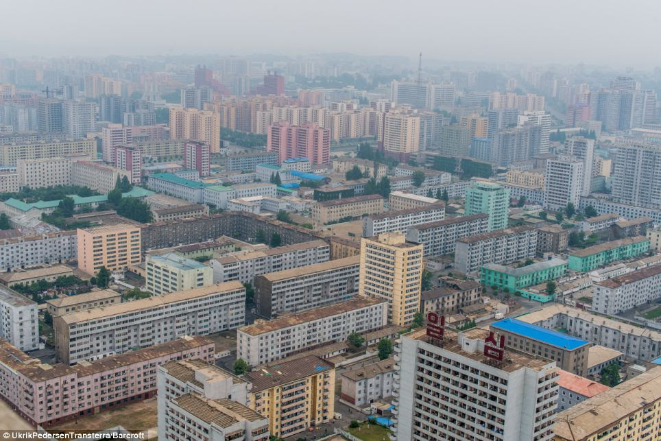 Mist hangs low over blocks of apartment buildings in this shot Pedersen took in the North Korean capital of Pyongyang while being given a guided tour of the country