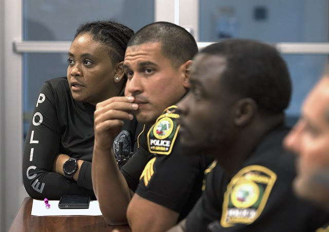 Police officers in a team meeting