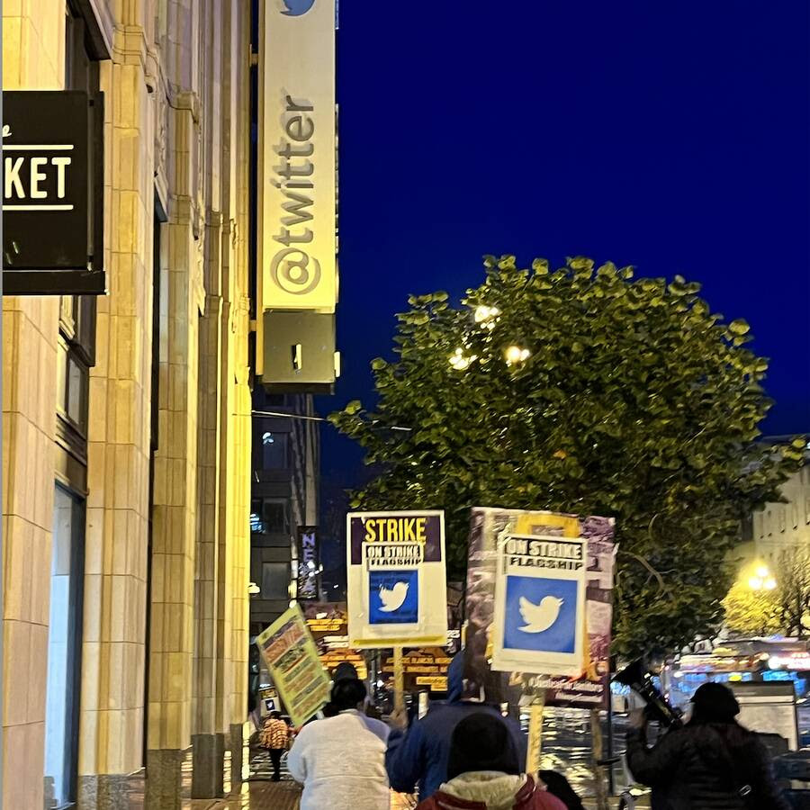 Protesting janitors march outside Twitter's San Francisco office, December 5.