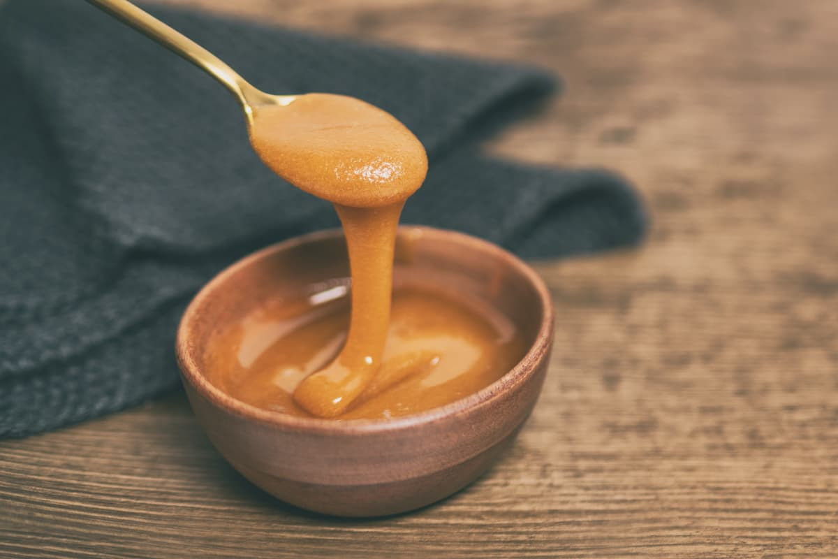 Manuka honey is produced in Australia and New Zealand by bees that pollinate the tea tree shrub