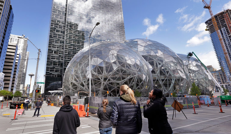 The Amazon headquarters in Seattle. Amazon Web Services is the leader in cloud computing services, but Microsoft and Alphabet are investing heavily to close the gap.