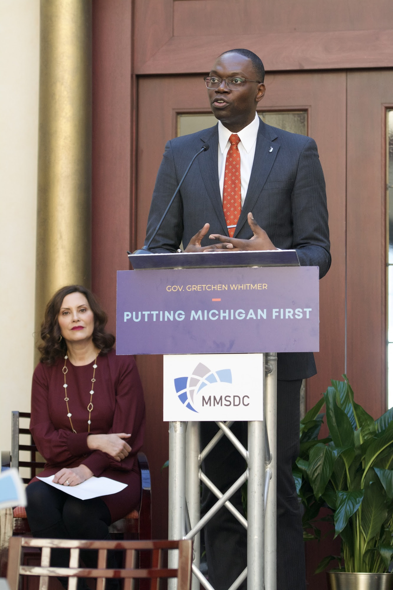 Lieutenant Governor Gilchrist speaking at podium 