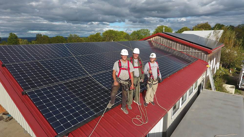 Crew poses during a solar installation project | Photo courtesy Renovus Solar