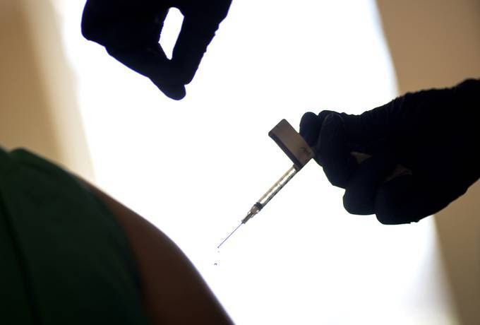 An injection of the Pfizer vaccine at a hospital in Providence, R.I. (AP Photo/David Goldman, File)