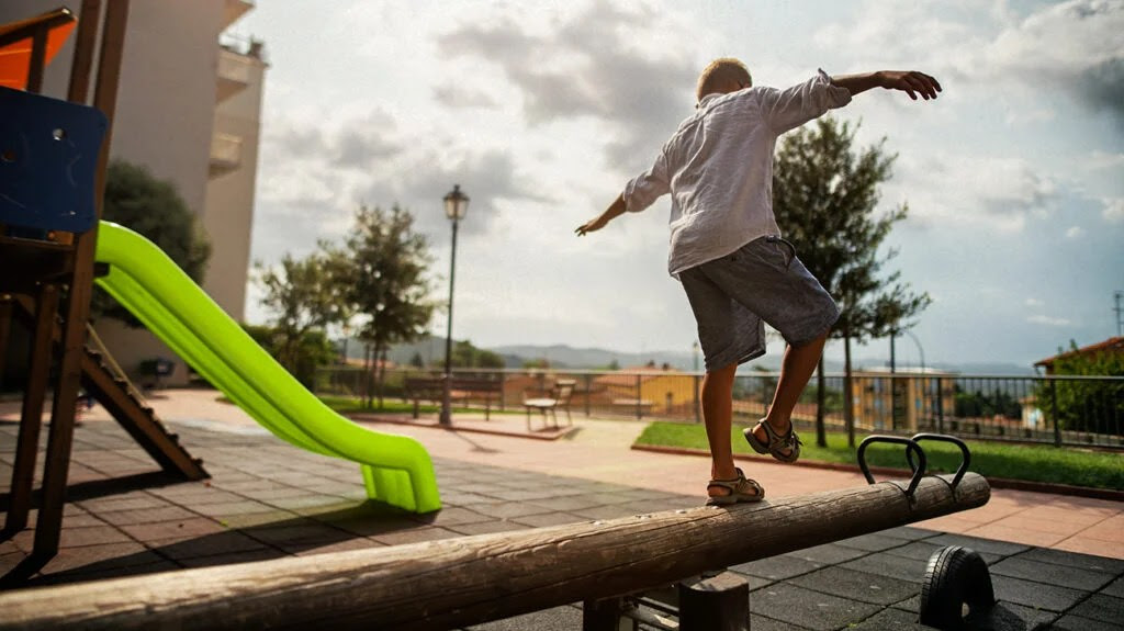 Child with ADHD plays at park.