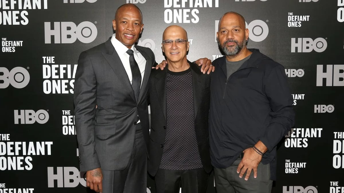 (L) Dr. Dre, Jimmy Lovine, and Allen Hughes attend the premiere of 