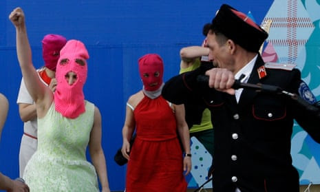 ‘A seven-year sentence isn’t enough – give us 18!’ …members of the collective are attacked by Cossack militia in Sochi, Russia, during the 2014 winter Olympics.