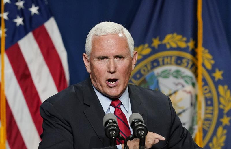 Mike Pence speaks directly into microphone during speech