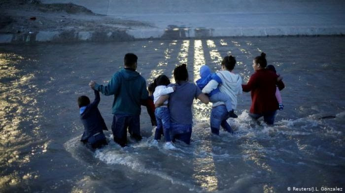 migrantes por rio bravo