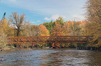 An Iron Belle Trail pedestrian bridge over the Huron River is shown in Washtenaw County.