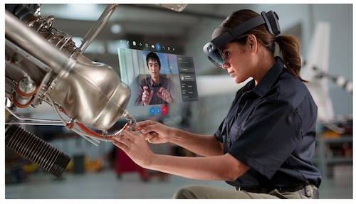 Simulated image of a field maintenance technician wearing HoloLens 2 and communicating with a remote expert via Dynamics 365 Remote Assist (source: Hitachi, Ltd.)