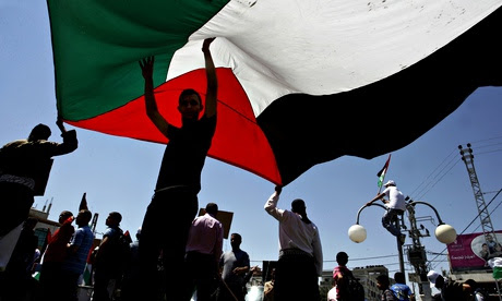 Palestinians with the Palestinian flag in the Gaza Strip