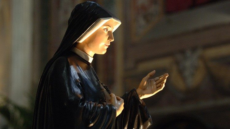 Statue of St. Faustina Kowalska in Rome's Church of the Holy Spirit in Saxony