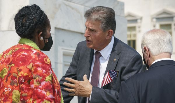 Sen. Joe Manchin, D-W.Va., speaks with Rep. Sheila Jackson Lee, D-Tex., left, and Rep. Mike Thompson, D-Calif., right, on the steps of the Capitol on Monday, Sept. 13, 2021. (AP Photo/J. Scott Applewhite) **FILE**