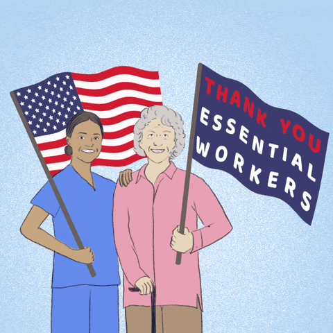Two women holding flags. One is the flag of the USA and the other is a blue and red flag with the words "Thank you essential workers" written on top