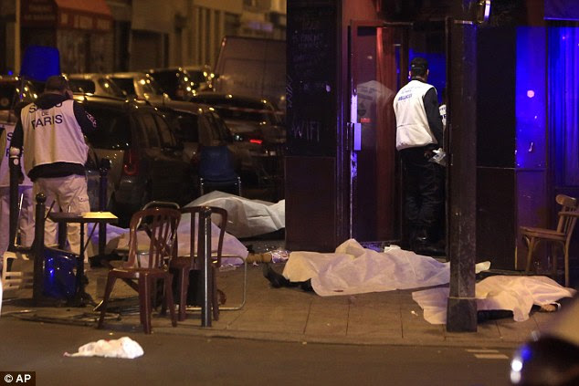 http://i.dailymail.co.uk/i/pix/2015/11/14/01/2E6C9FD000000578-0-Victims_lay_on_the_pavement_outside_Paris_restaurant_following_a-a-11_1447463447127.jpg