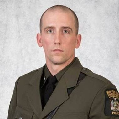 Profile of ECO Craig Tompkins in uniform