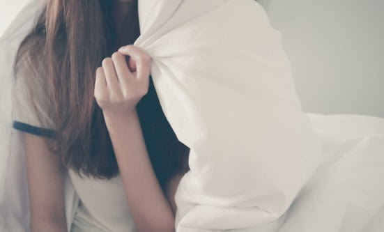 Woman under comforter: Photo by Tirachard Kumtanom from Pexels