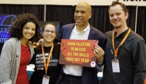 Pro- “Palestinian” group disputes Booker’s claim that he didn’t know sign he was holding was anti-Israel