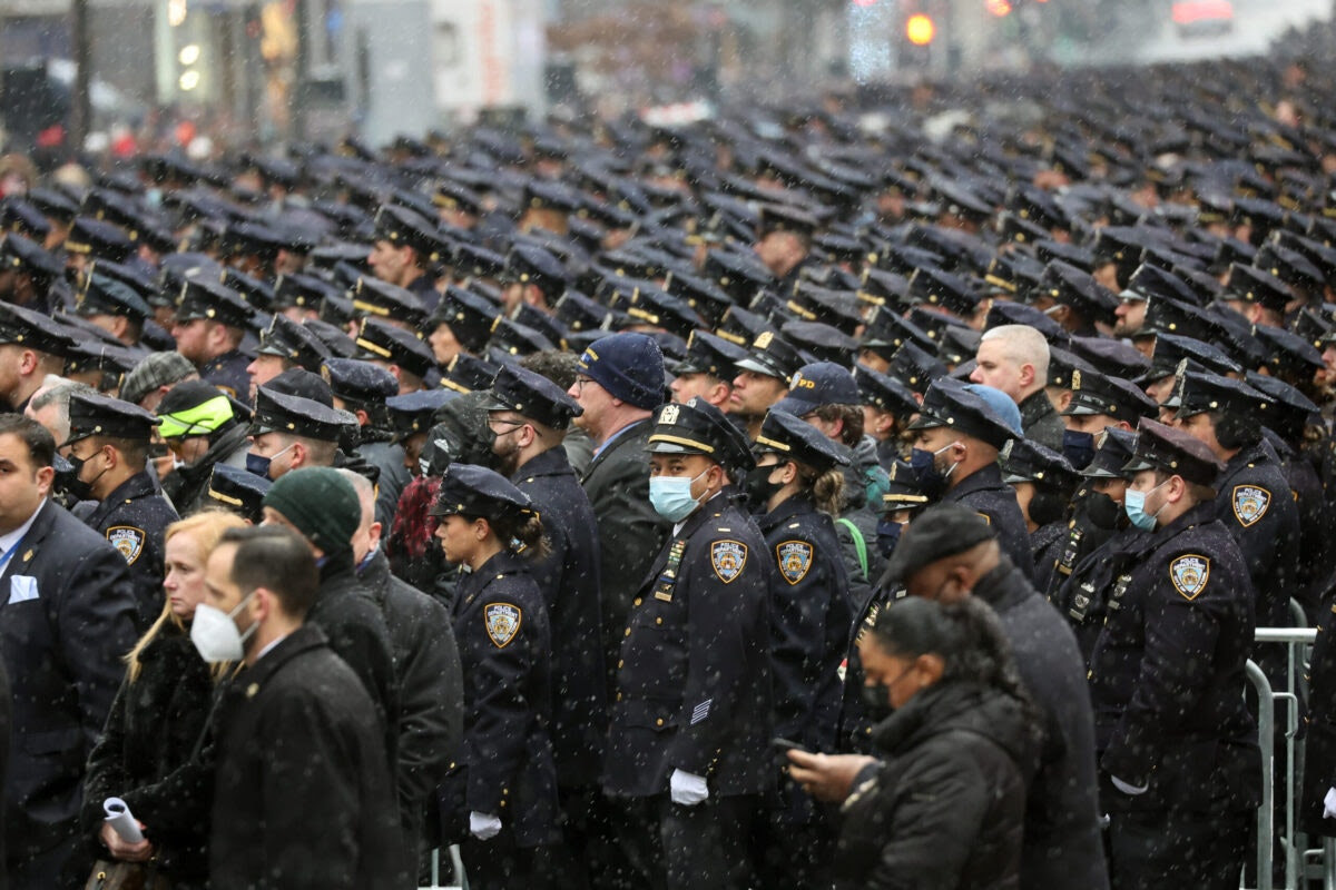 Thousands Of Police Officers Attend Funeral For Slain NYPD Cop