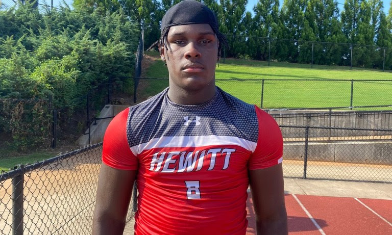 Hunter Osborne poses for picture after Heitt-Trussville practice