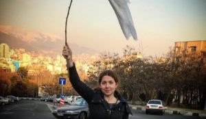 Twitter labels photo of Iranian woman without hijab “sensitive material”