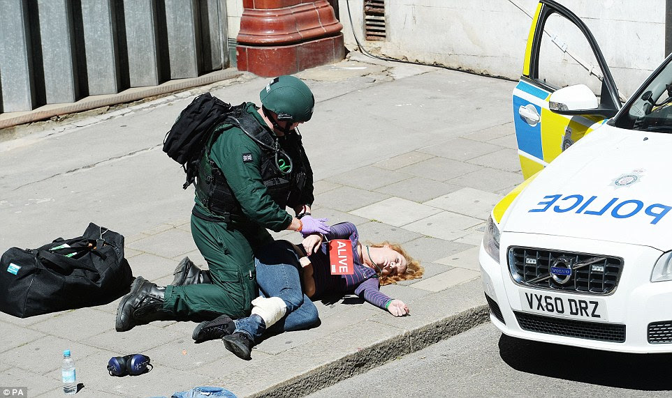 TV footage of the incident showed ambulance paramedic treating mock victims marked with signs during the staged 'attack'