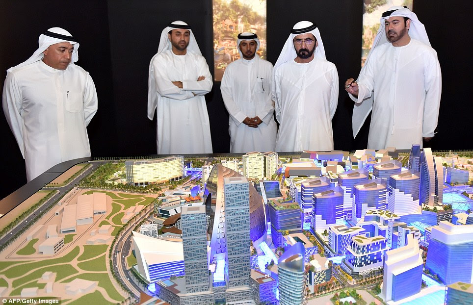 Tourism boon: Sheikh Mohammed Bin Rashid al-Maktoum (second right) hopes the development will urn Dubai into a year-round destination