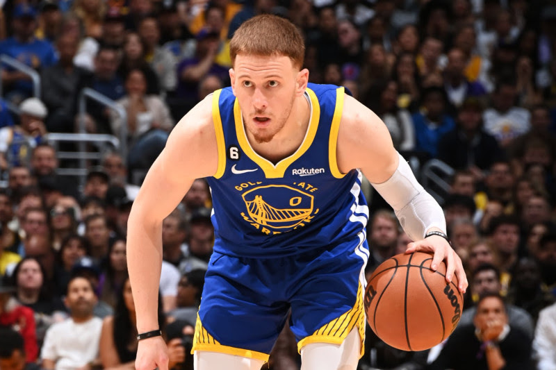 LOS ANGELES, CA - MAY 6: Donte DiVincenzo #0 of the Golden State Warriors dribbles the ball during Round 2 Game 3 of the Western Conference Semi-Finals 2023 NBA Playoffs against the Los Angeles Lakers on May 6, 2023 at Crypto.Com Arena in Los Angeles, California. NOTE TO USER: User expressly acknowledges and agrees that, by downloading and/or using this Photograph, user is consenting to the terms and conditions of the Getty Images License Agreement. Mandatory Copyright Notice: Copyright 2023 NBAE (Photo by Andrew D. Bernstein/NBAE via Getty Images)