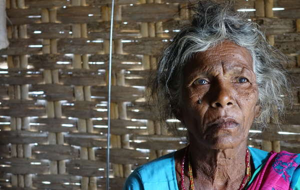 Chenchu woman from Pecheru village. The village was evicted in the ’80s. Chenchu report that of the 750 families that used to live in the village, just 160 families survived after the eviction took place. Many starved to death. Nagarjunsagar Srisailam Tiger Reserve.
