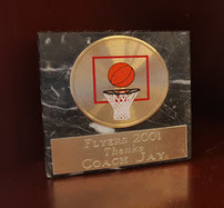 Trophy that says Flyers 2001 Thanks Coach Jay