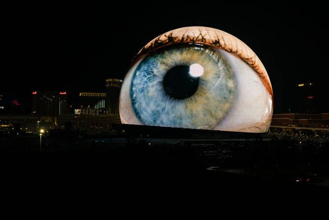 The Sphere in Las Vegas showing an eyeball in the night sky.