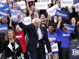 Democratic presidential candidate Sen. Bernie Sanders, I-Vt., with his wife Jane O&#39;Meara Sanders, arrives to speak to supporters at a primary night election rally in Manchester, N.H., Tuesday, Feb. 11, 2020. (AP Photo/Pablo Martinez Monsivais)