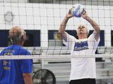 In this Aug. 8, 2014, file photo, Richard Desmond, of Huntley, Ill., sets the ball while participating in a pilot volleyball program for senior citizens at Fusion Sports Center in Marengo, Ill. Most of the players met at the Huntley Park District facility, and they come from all kinds of backgrounds. All love volleyball, want to stay in shape and like the camaraderie and competition. (AP Photo/Northwest Herald, Sarah Nader) ** FILE **