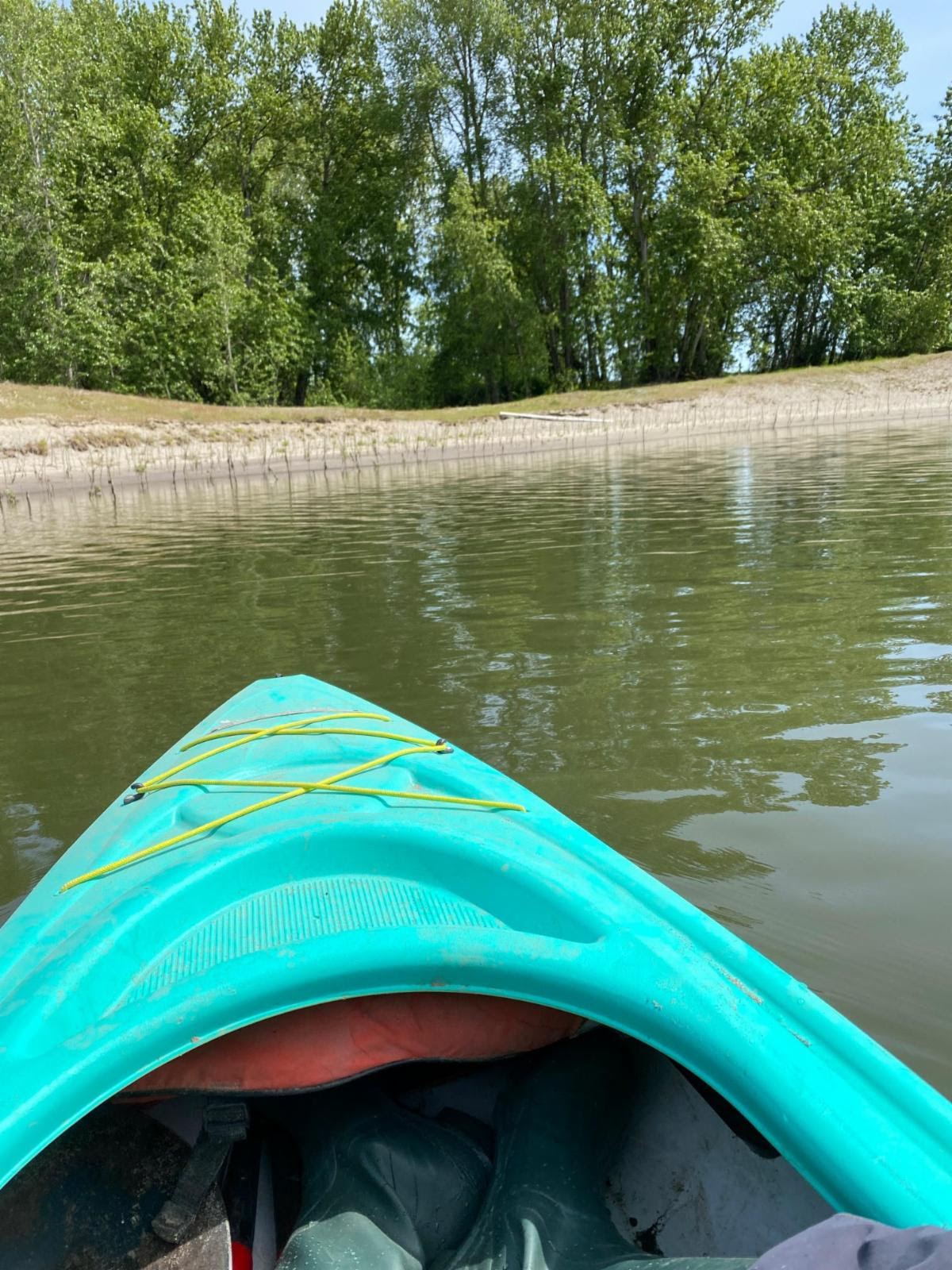 Justine kayaking across Turtle Lake