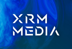 XRM Media logo against a marbled blue and white background. 