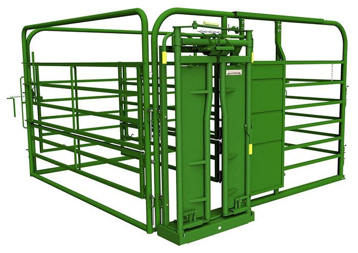 Empty maternity pen consisting of metal tube panels and a head gate