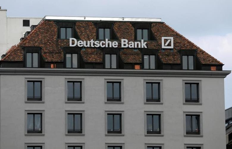 A logo is pictured on the Deutsche Bank building in Geneva, Switzerland, October 11, 2016.  REUTERS/Denis Balibouse/File Photo