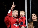 Washington Capitals left wing Alex Ovechkin, left, of Russia; Ovechkin&#39;s wife, Nastya, right; and son Sergei, center, watch the video screen on the scoreboard during a ceremony to honor Ovechkin for his 700th goal, before the team&#39;s NHL hockey game against the Winnipeg Jets, Tuesday, Feb. 25, 2020, in Washington. (AP Photo/Nick Wass)