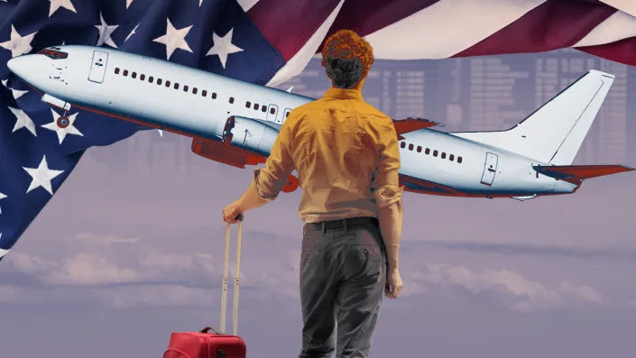 A photo illustration shows a man holding a wheeled carry-on, a passenger jet taking off and the U.S. flag.