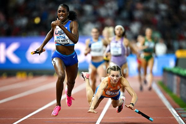 Photograph of the Year finalist - Alexis Holmes and Femke Bol in the mixed 4x400m in Budapest
