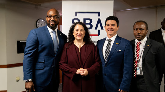 D9 signing with SBA Administrator and Region 4 Administrator Allen Thomas