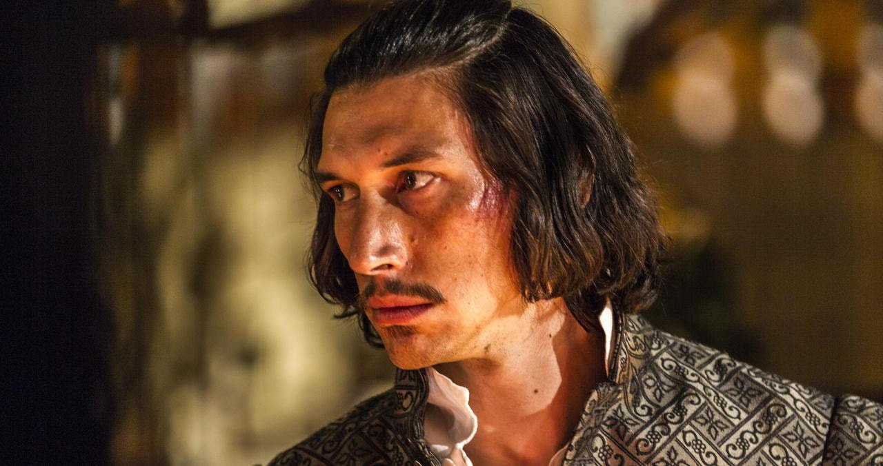 Adam Driver looking concerned as dressed in old Spanish clothes