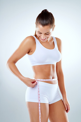 I Finally Found A Weightloss Product That Works Stock Photo - Download  Image Now - Tape Measure, 20-29 Years, Adult - iStock