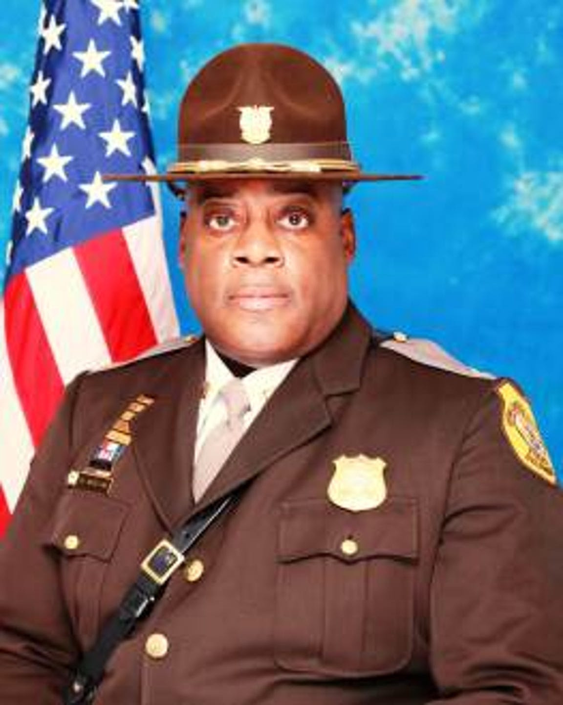 Retired Lt. Col. Quinton Watson faces sexual assault and harassment allegations from six women who worked in the department.