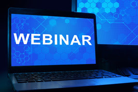 computer with webinar written on the screen